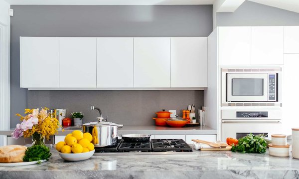 What's the Best Approach to Kitchen Design That Encourages Waste Reduction and Recycling?